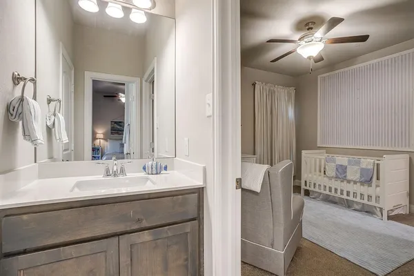 a balcony with furniture and a garden