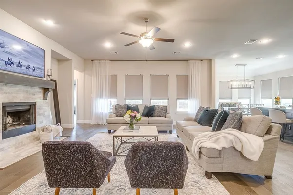 a kitchen with granite countertop white cabinets granite counter tops and chairs