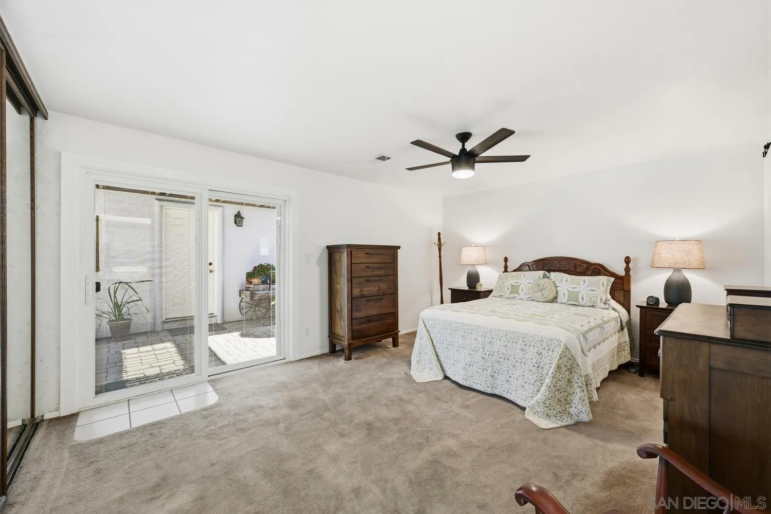 944 Hillhaven Road Escondido, CA 92027 - Photo 11 of 31 a spacious bedroom with a bed and window