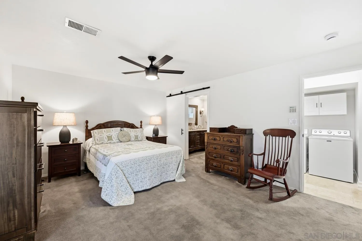 944 Hillhaven Road Escondido, CA 92027 - Photo 12 of 31 a bedroom with a bed a desk and chair