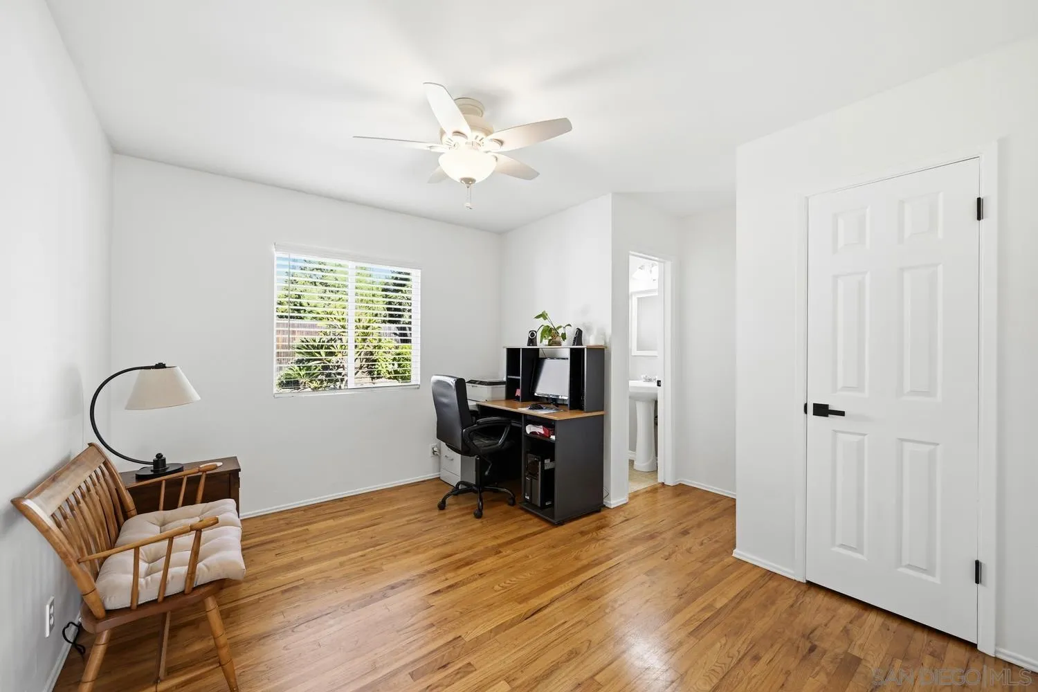 944 Hillhaven Road Escondido, CA 92027 - Photo 15 of 31 a view of a workspace with furniture and a window