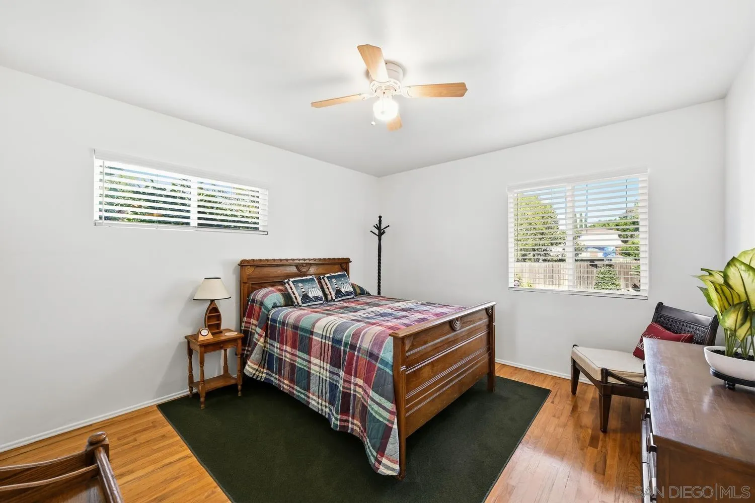 944 Hillhaven Road Escondido, CA 92027 - Photo 17 of 31 a bed room with a bed and a window
