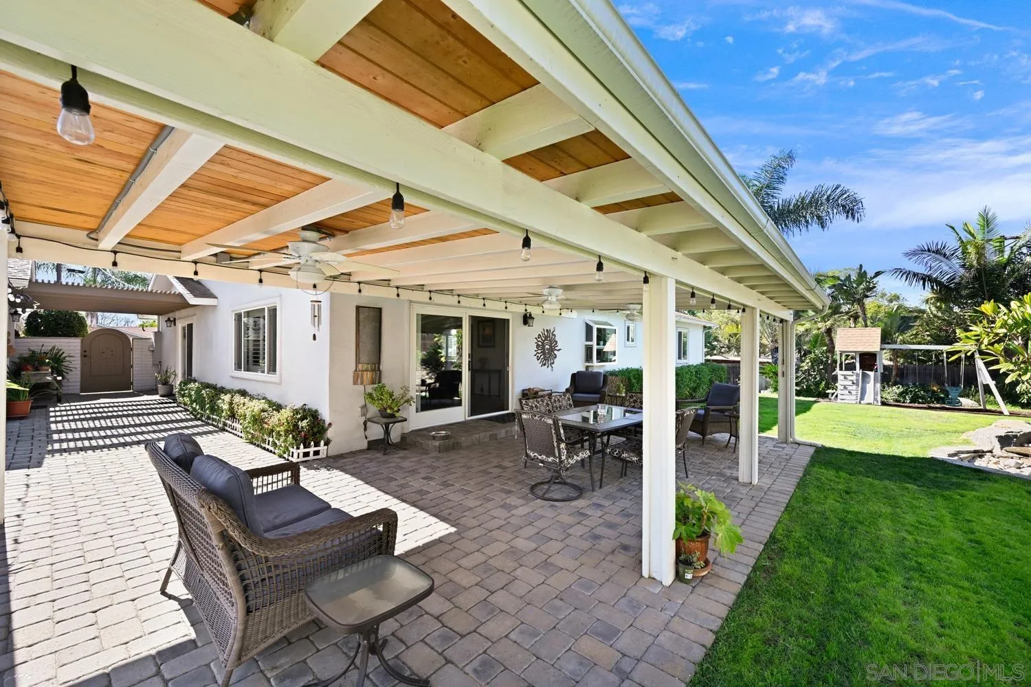 944 Hillhaven Road Escondido, CA 92027 - Photo 21 of 31 a view of a backyard with sitting area and furniture