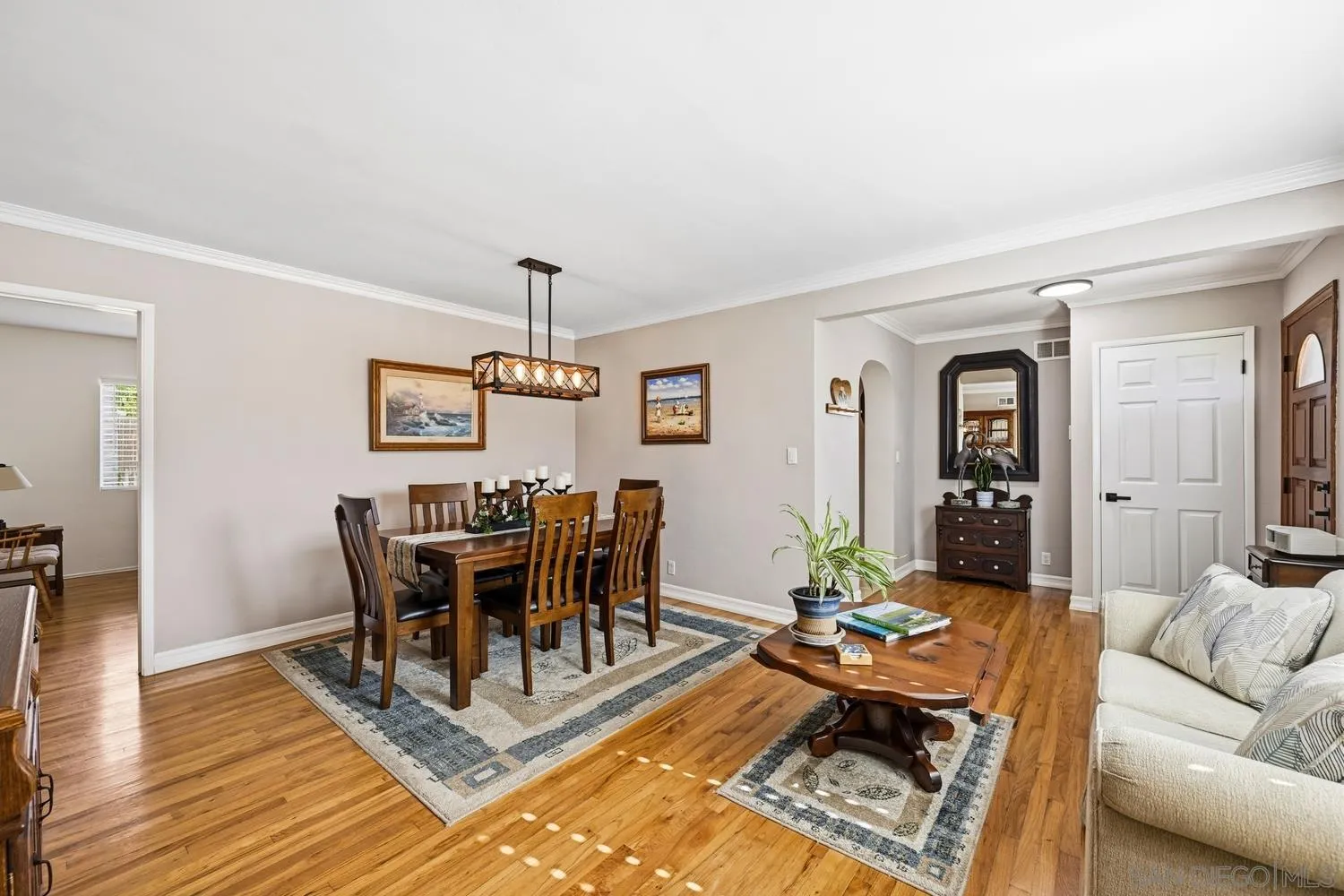 944 Hillhaven Road Escondido, CA 92027 - Photo 4 of 31 a living room with furniture a dining table and a rug
