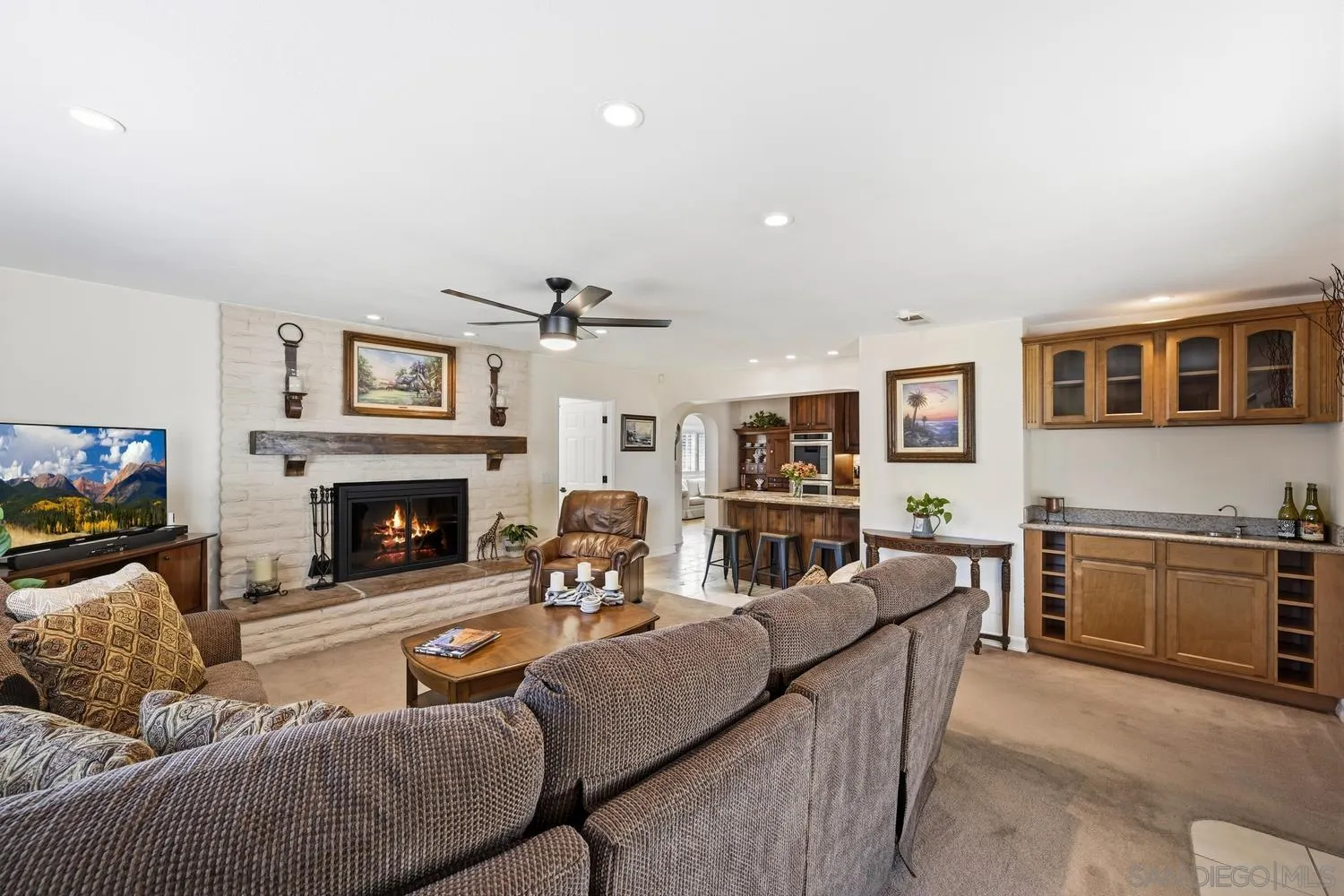 944 Hillhaven Road Escondido, CA 92027 - Photo 10 of 31 a living room with furniture and a fireplace