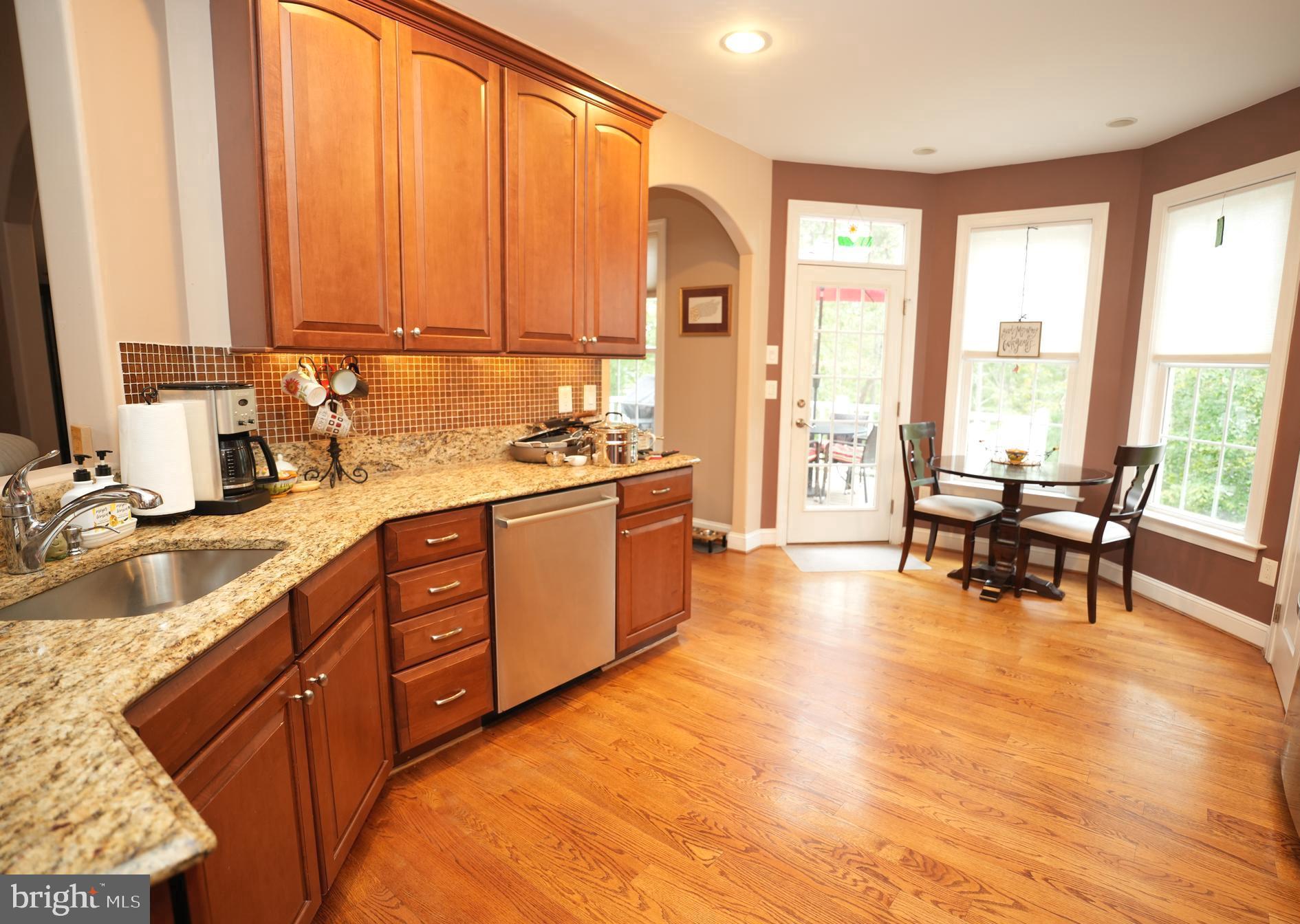23531 Myrtle Point Road California, MD 20619 - Photo 13 of 50 Hardwood in kitchen