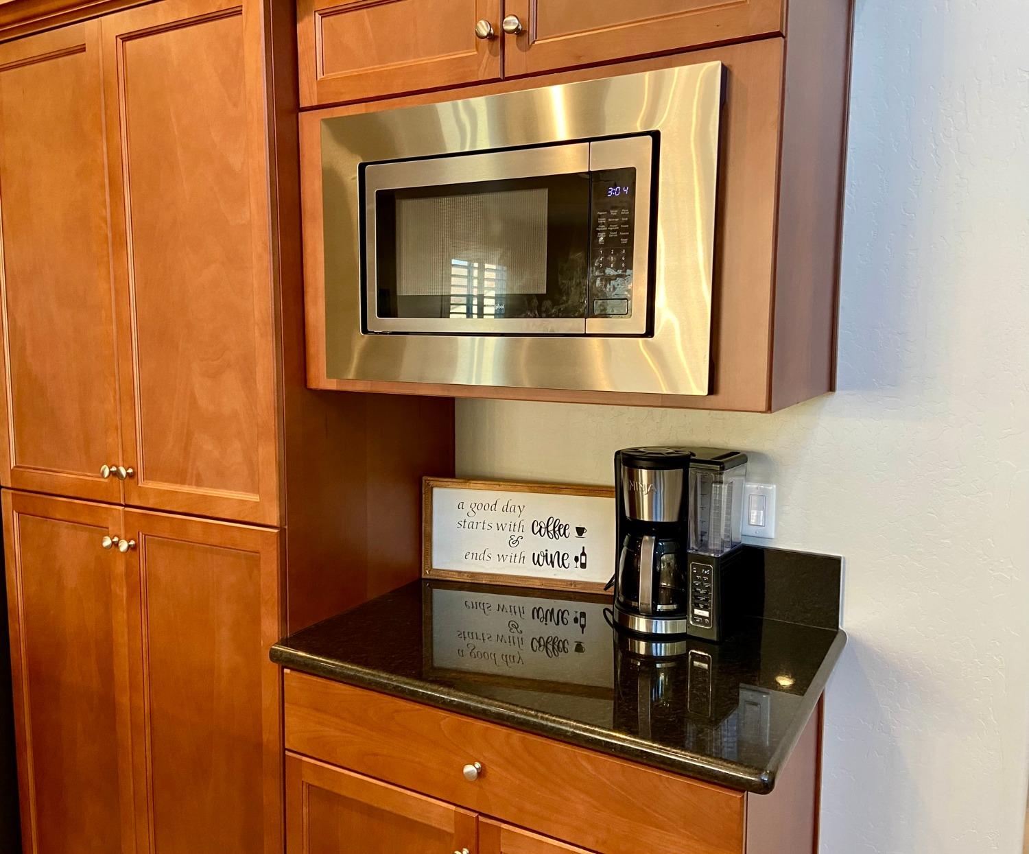 3967 Lincoln Avenue Clovis, CA 93611 - Photo 15 of 70 a close view of a microwave and cabinets