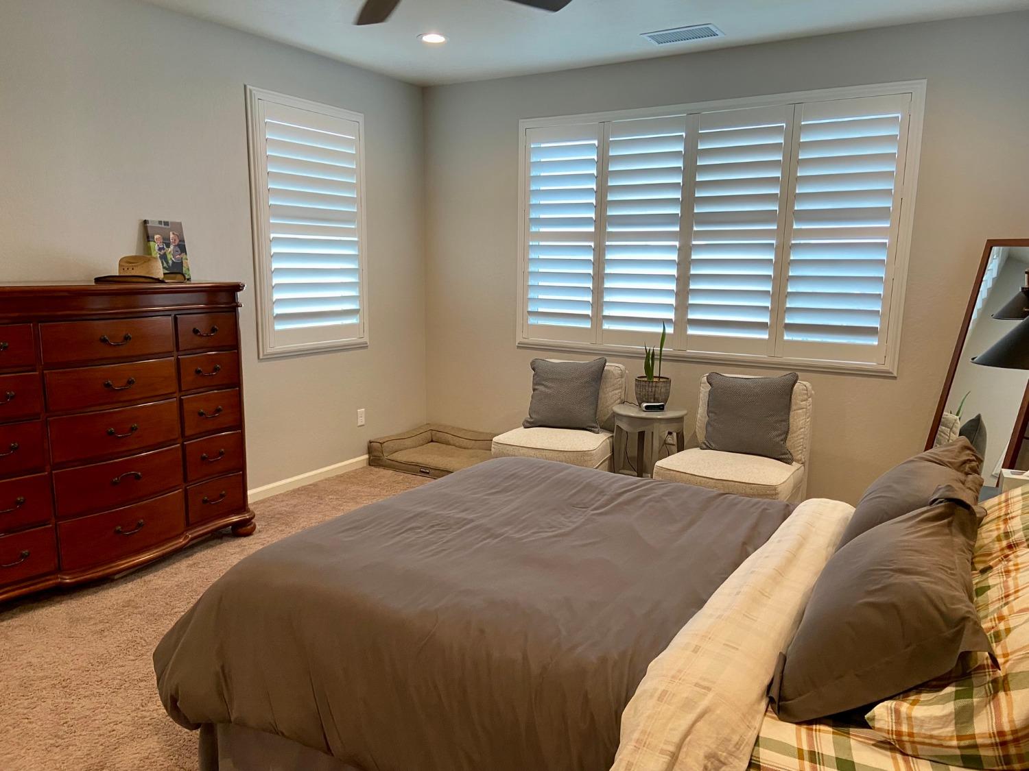 3967 Lincoln Avenue Clovis, CA 93611 - Photo 36 of 70 a bedroom with a bed and a window