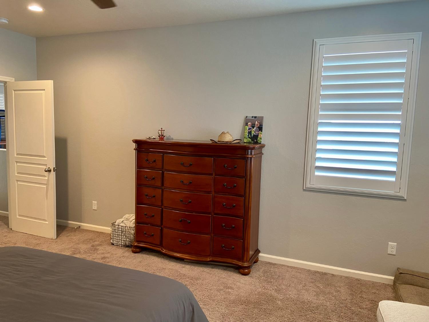 3967 Lincoln Avenue Clovis, CA 93611 - Photo 37 of 70 a room with a dresser and a window