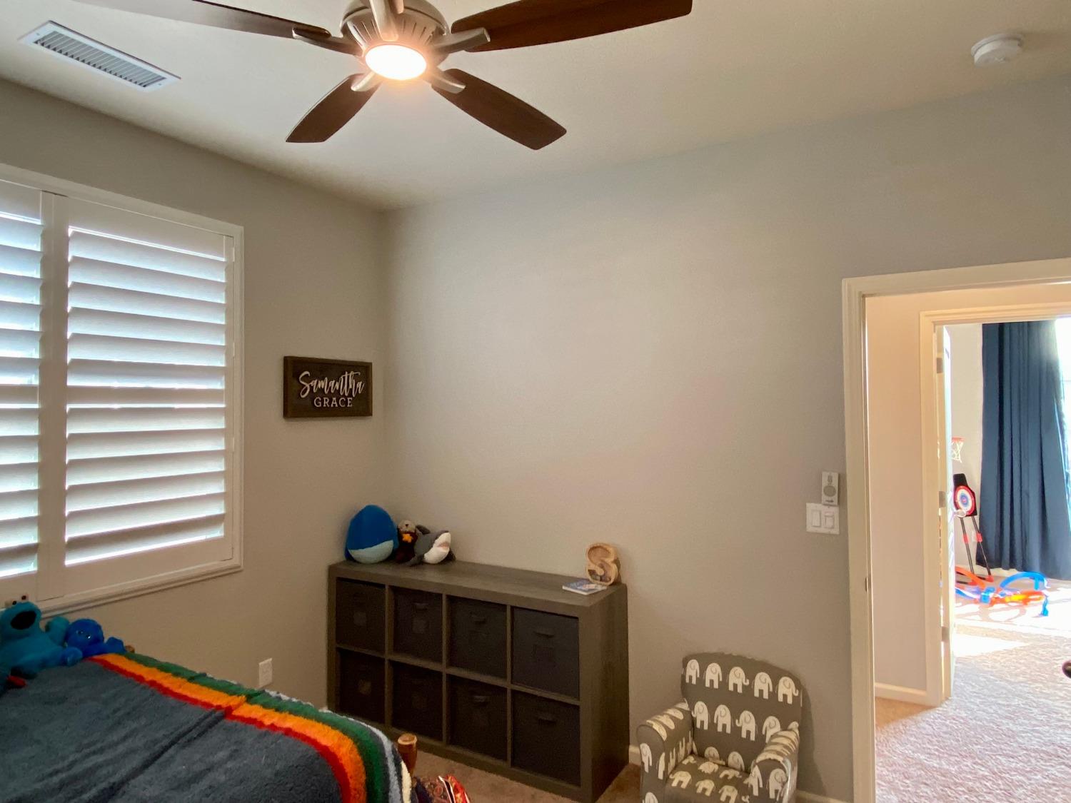 3967 Lincoln Avenue Clovis, CA 93611 - Photo 47 of 70 a bed room with a bed and a window