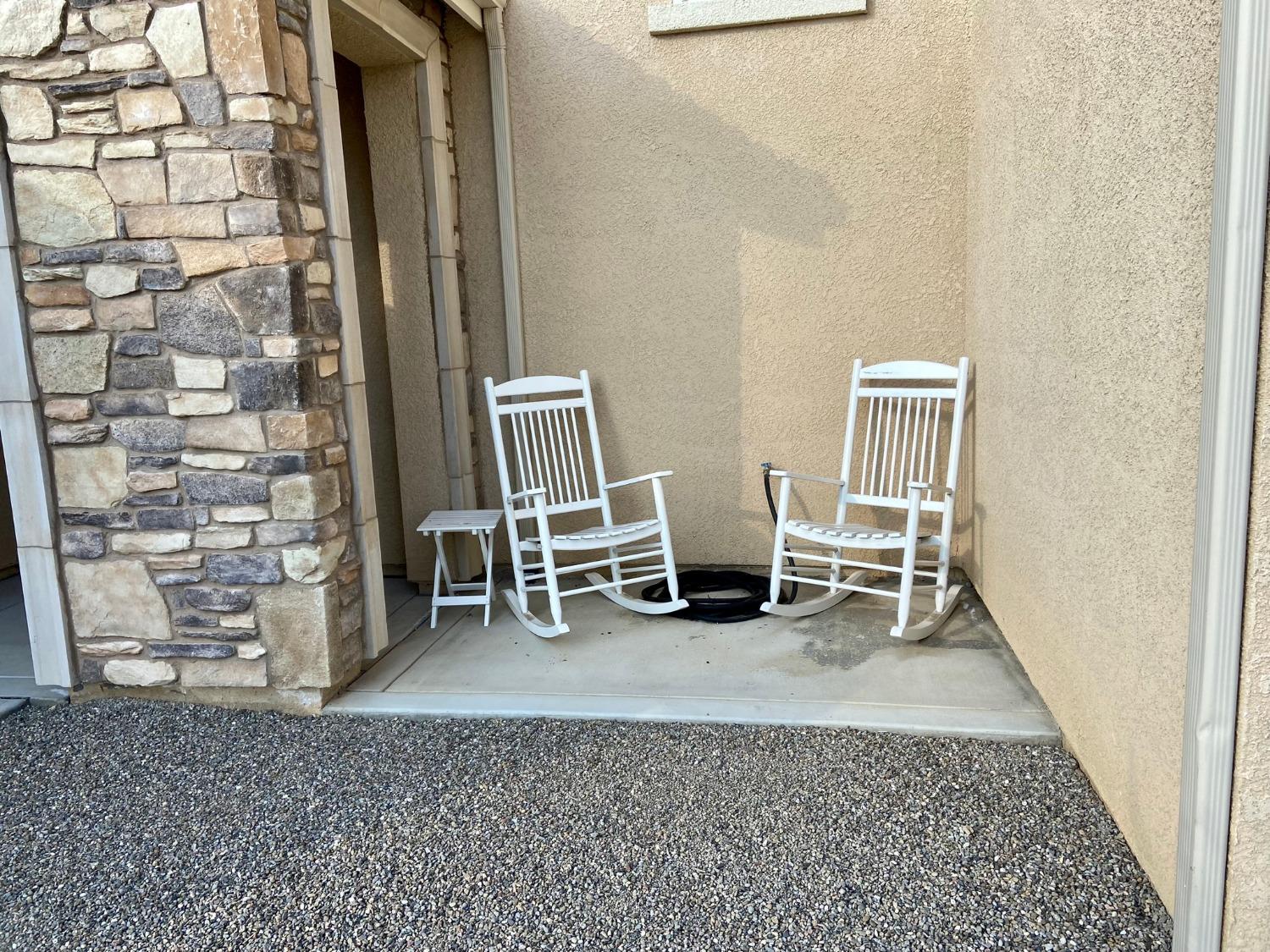 3967 Lincoln Avenue Clovis, CA 93611 - Photo 5 of 70 a view of a room with chairs and front door