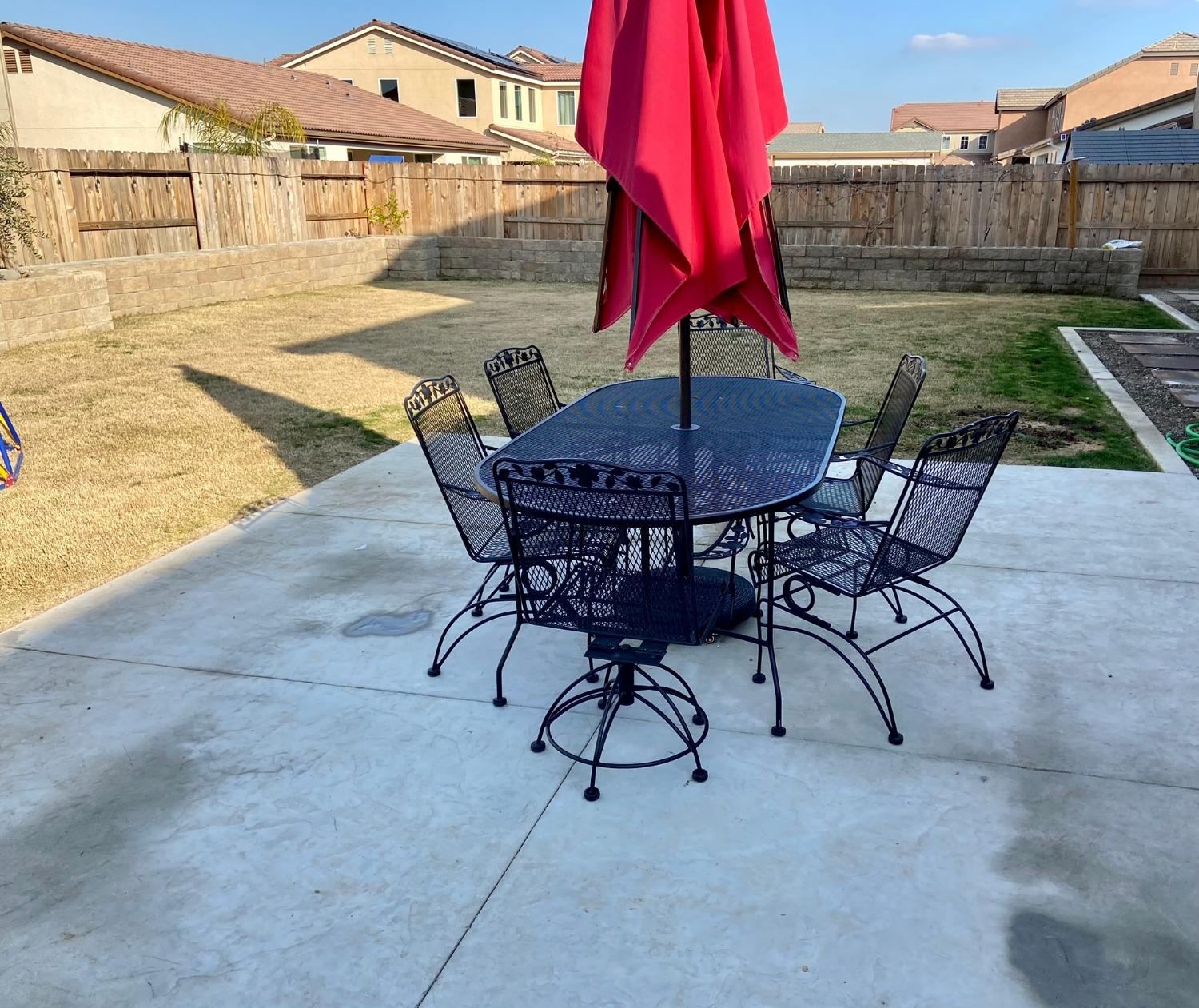 3967 Lincoln Avenue Clovis, CA 93611 - Photo 68 of 70 a view of backyard with table and chairs
