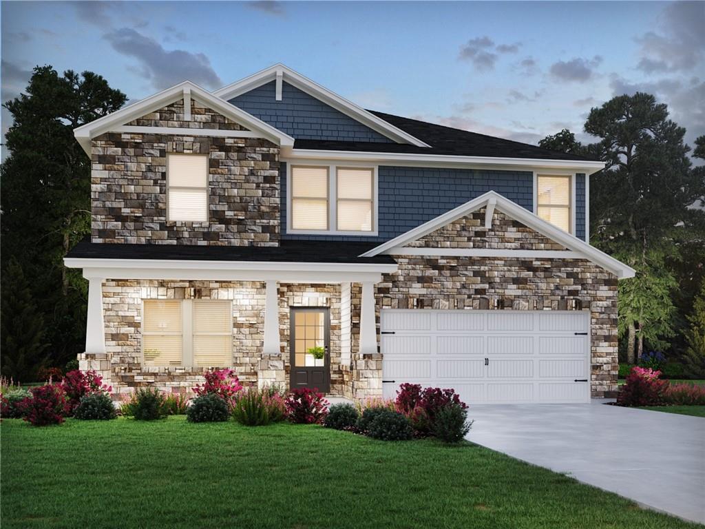 93 Proust Circle Dallas, GA 30132 - Photo 1 of 18 a front view of a house with a garden