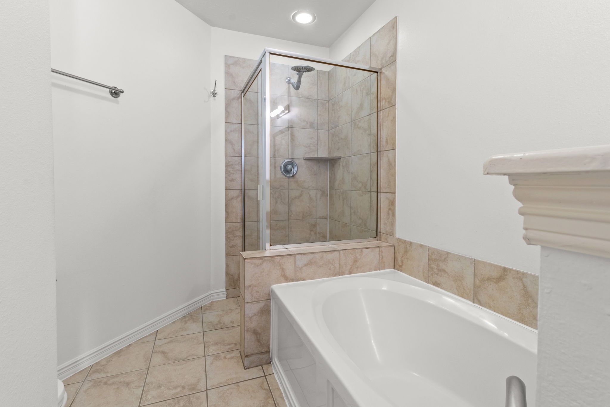 3506 Garrow Street Houston, TX 77003 - Photo 17 of 32 a bathroom with a bathtub and a shower