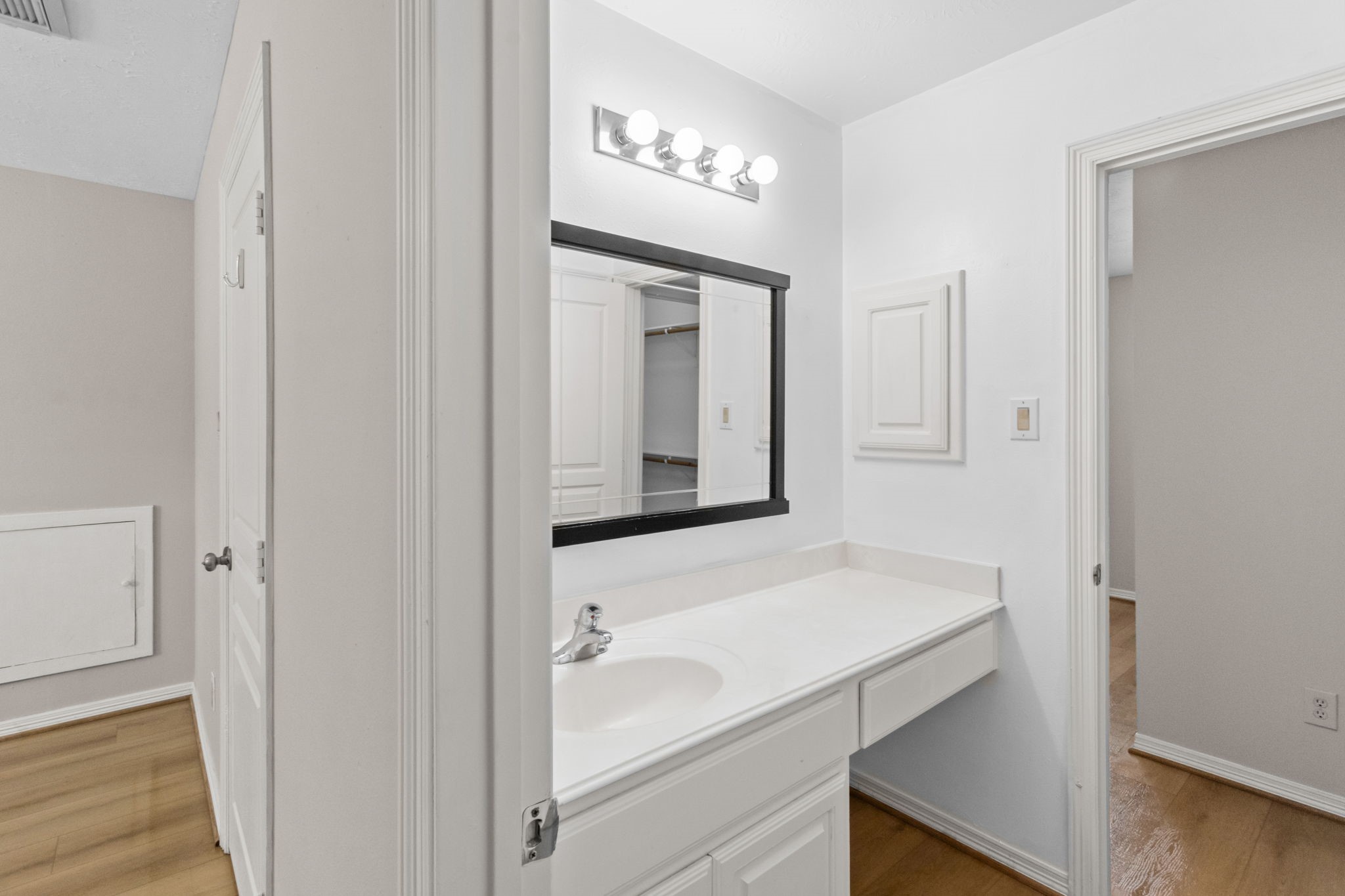 3506 Garrow Street Houston, TX 77003 - Photo 26 of 32 a bathroom with a sink and a mirror