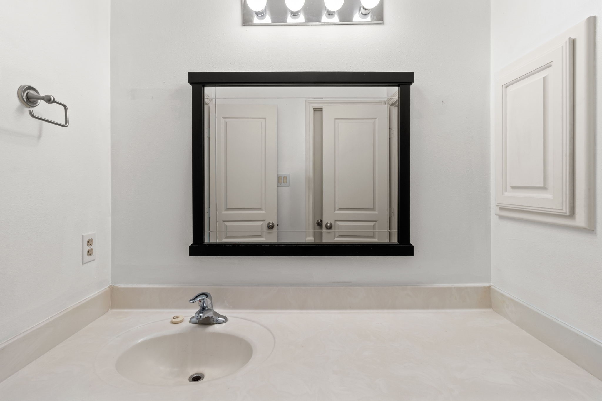3506 Garrow Street Houston, TX 77003 - Photo 27 of 32 a bathroom with a sink and a mirror