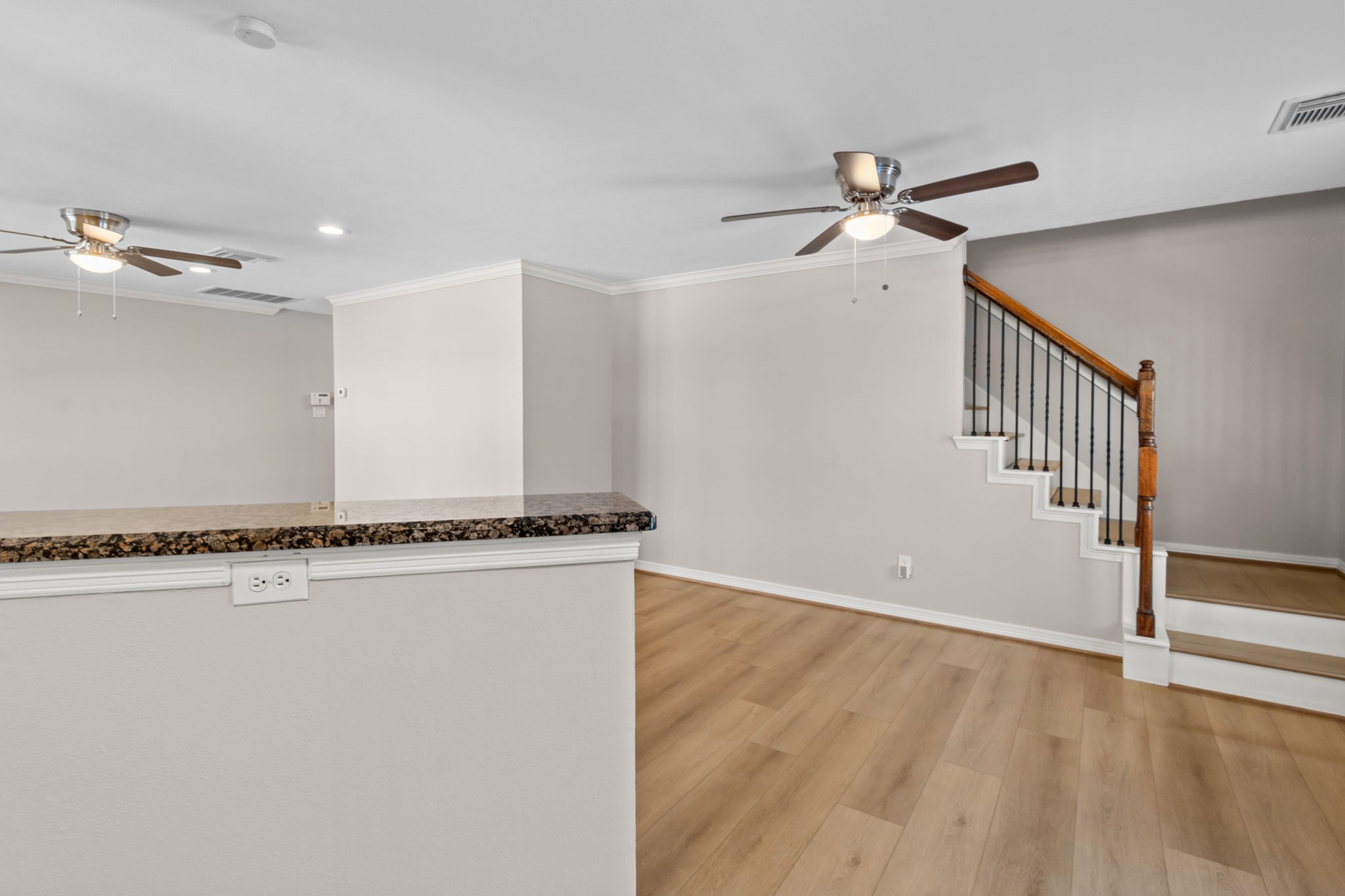 3506 Garrow Street Houston, TX 77003 - Photo 7 of 32 a view of a kitchen with wooden floor