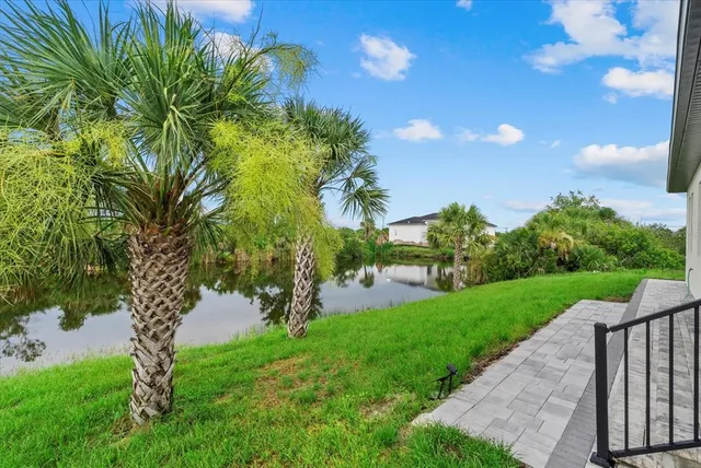 an aerial view of a house with a garden