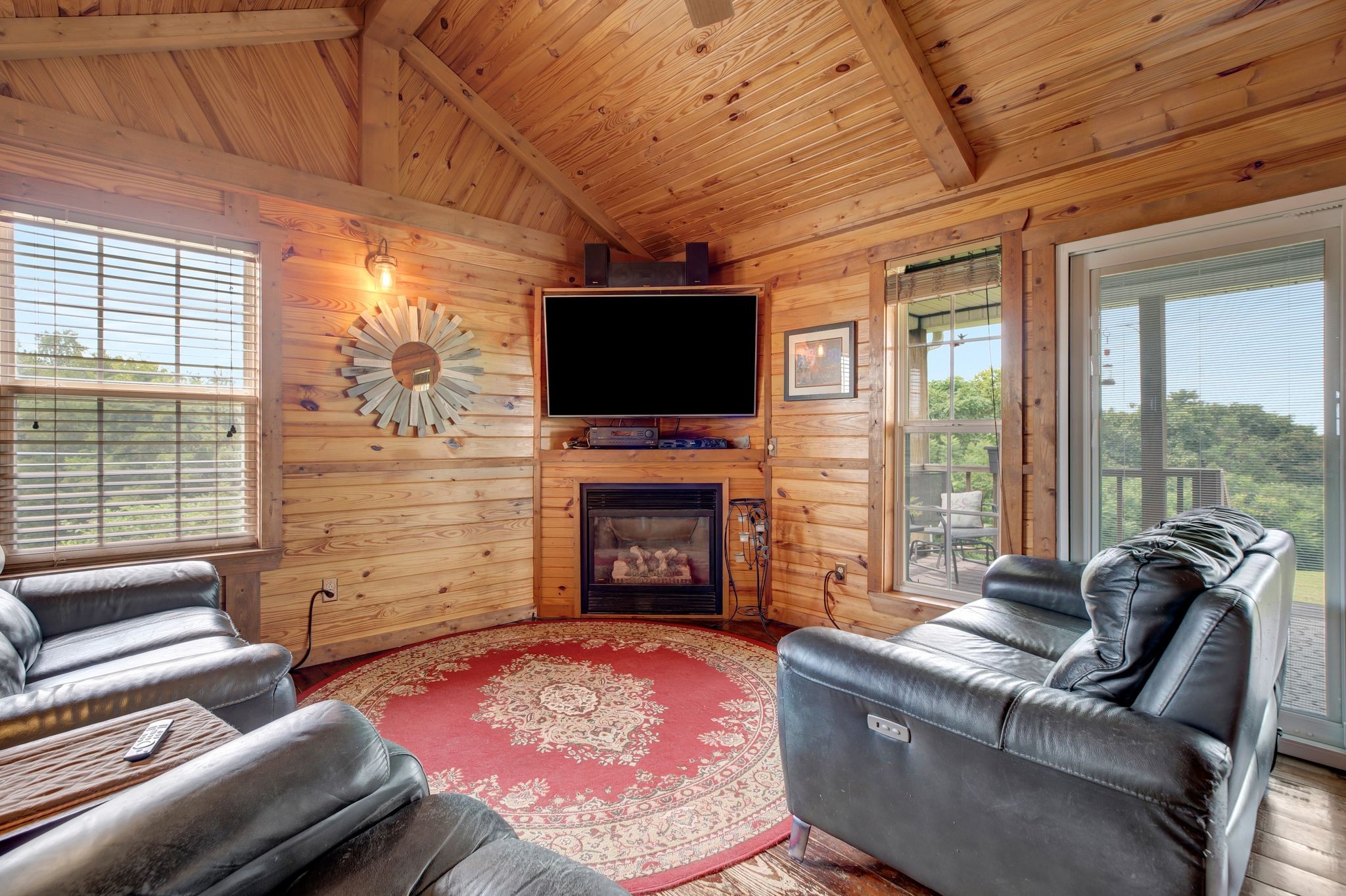 5461 Dale Ridge Road Liberty, TN 37095 - Photo 8 of 39 a living room with furniture a flat screen tv and a fireplace
