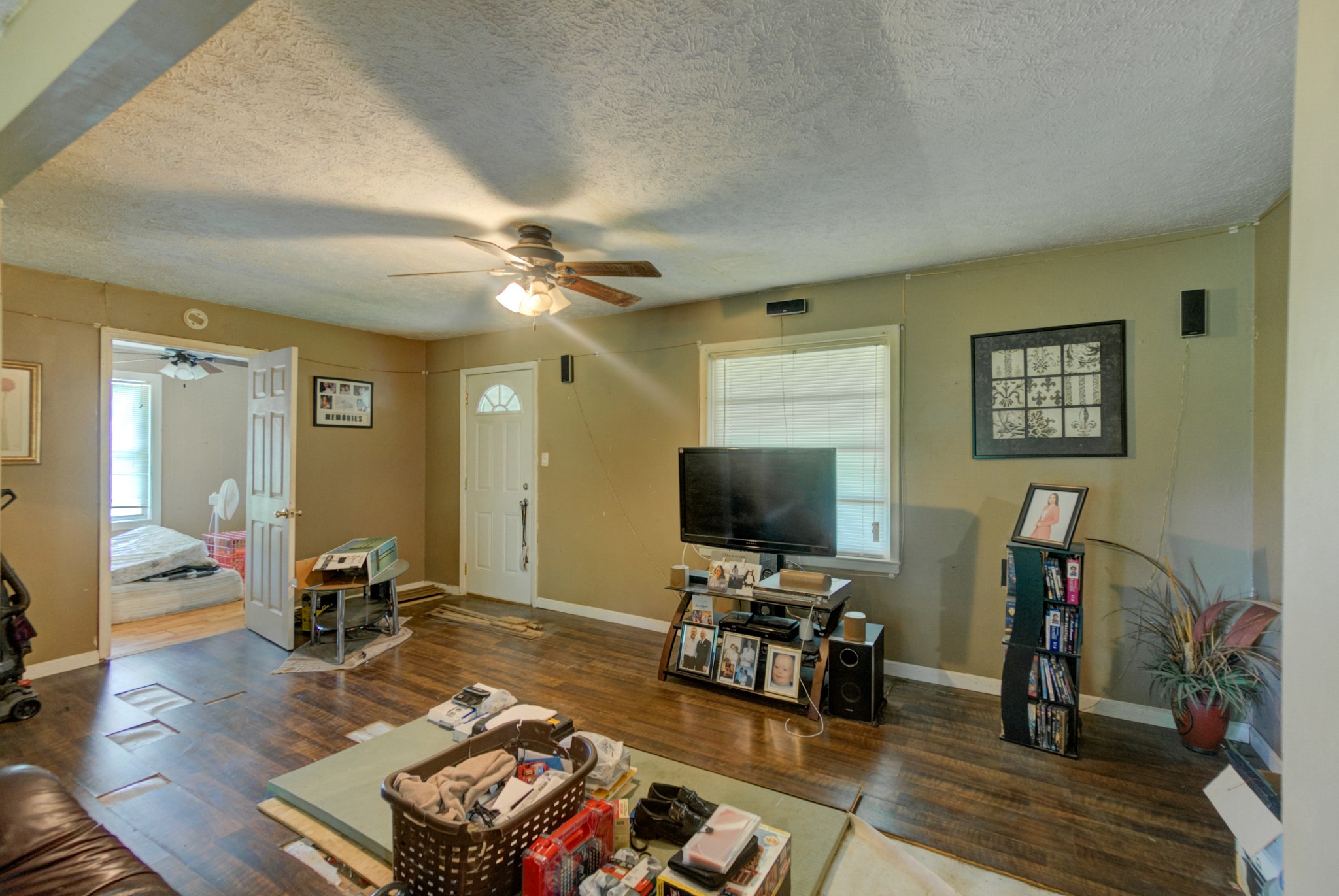 4066 Beech Bluff Road Beech Bluff, TN 38313 - Photo 6 of 14 a living room with furniture and a flat screen tv