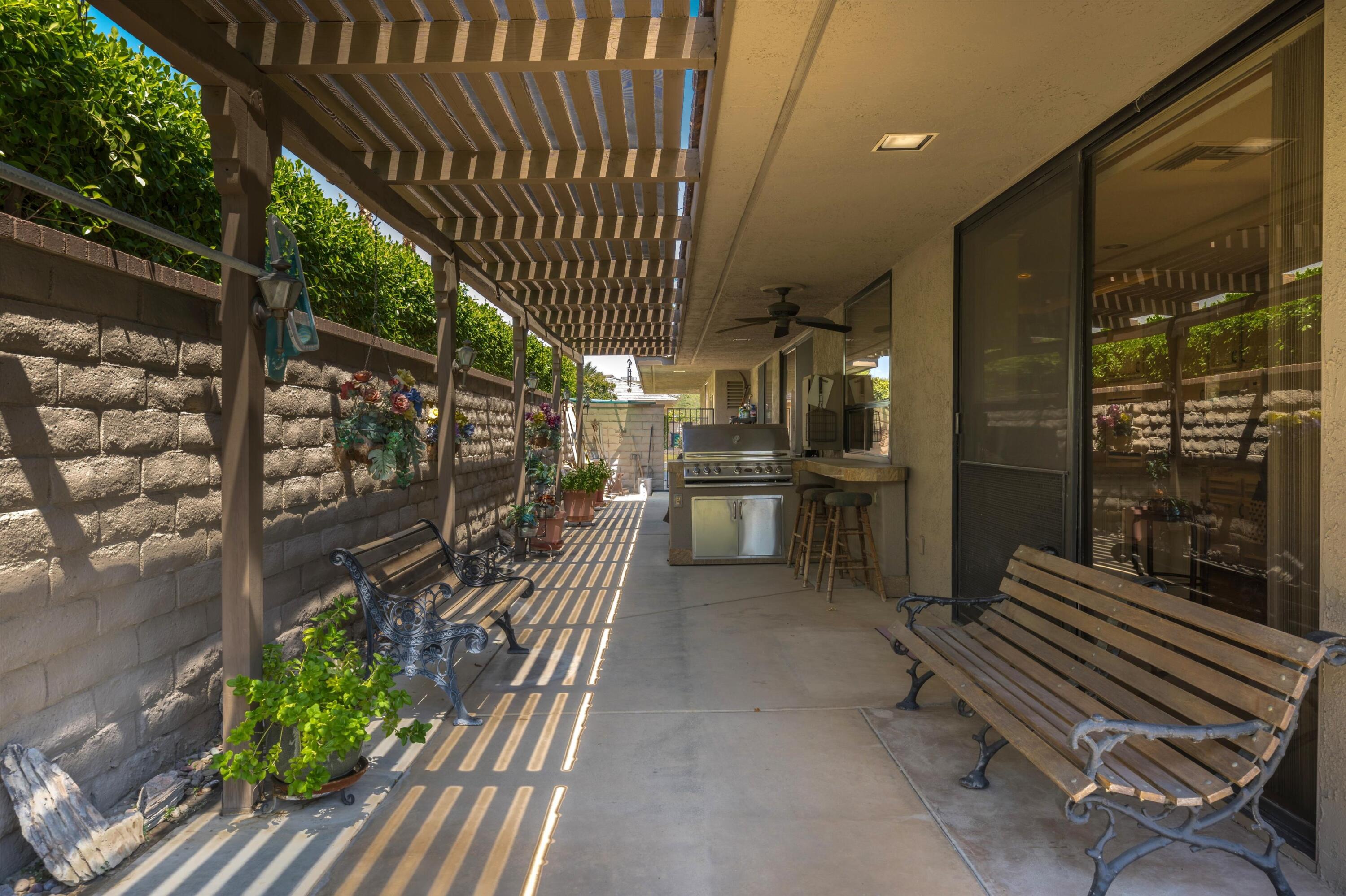 48 Cornell Drive Rancho Mirage, CA 92270 - Photo 36 of 39 a view of a chairs and table in the balcony