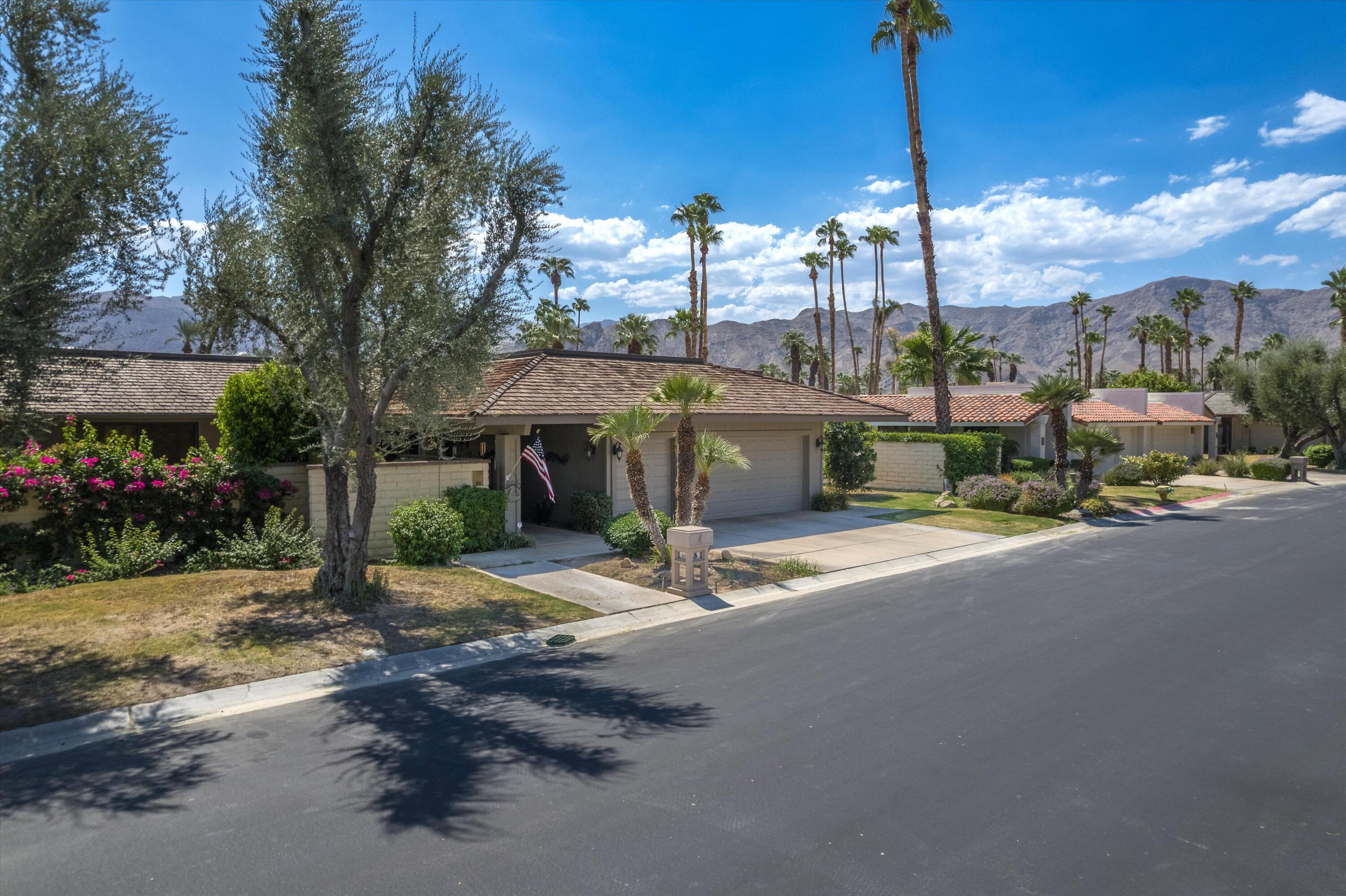 48 Cornell Drive Rancho Mirage, CA 92270 - Photo 38 of 39 a view of a street with cars