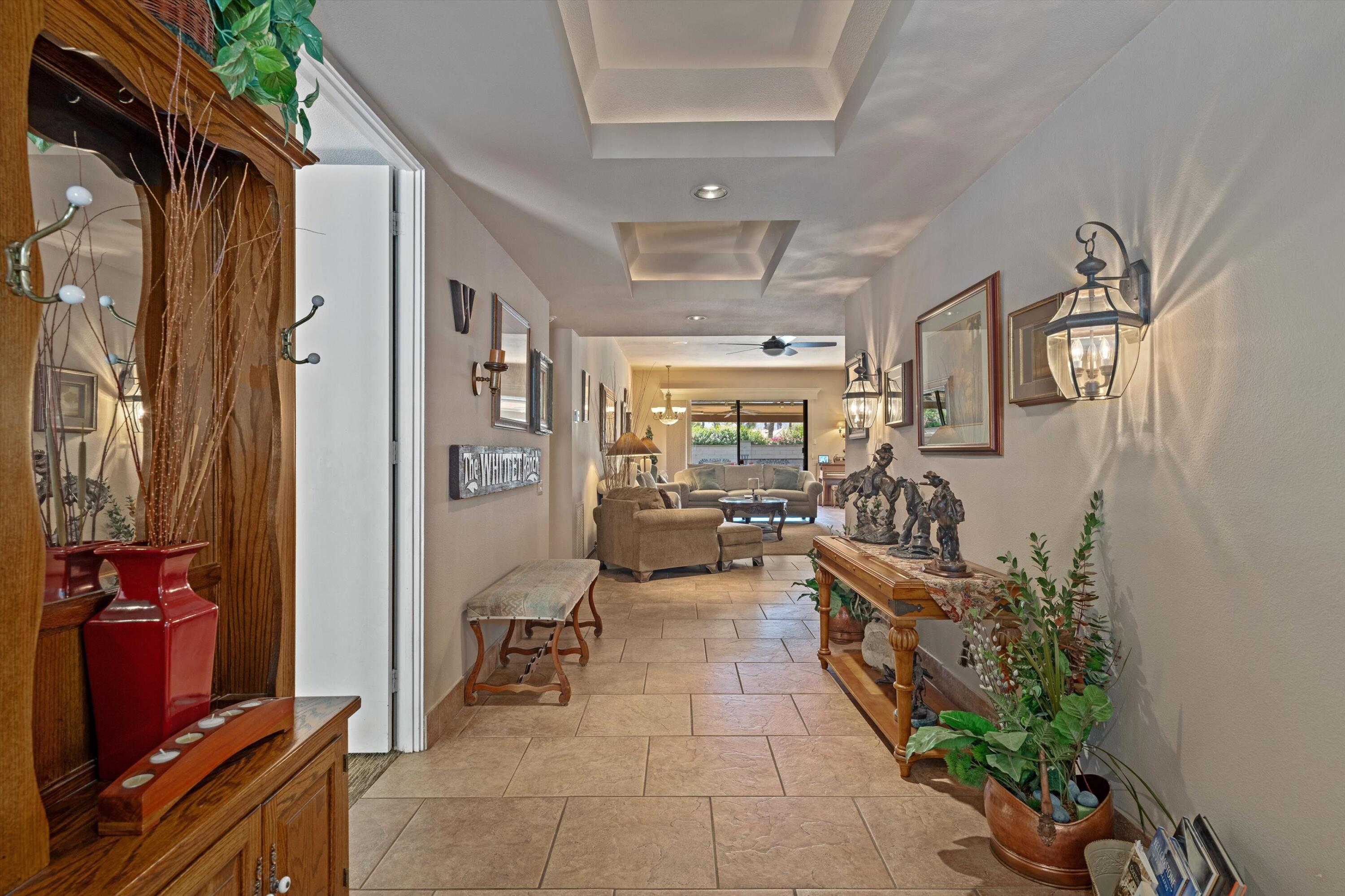 48 Cornell Drive Rancho Mirage, CA 92270 - Photo 5 of 39 a living room with furniture