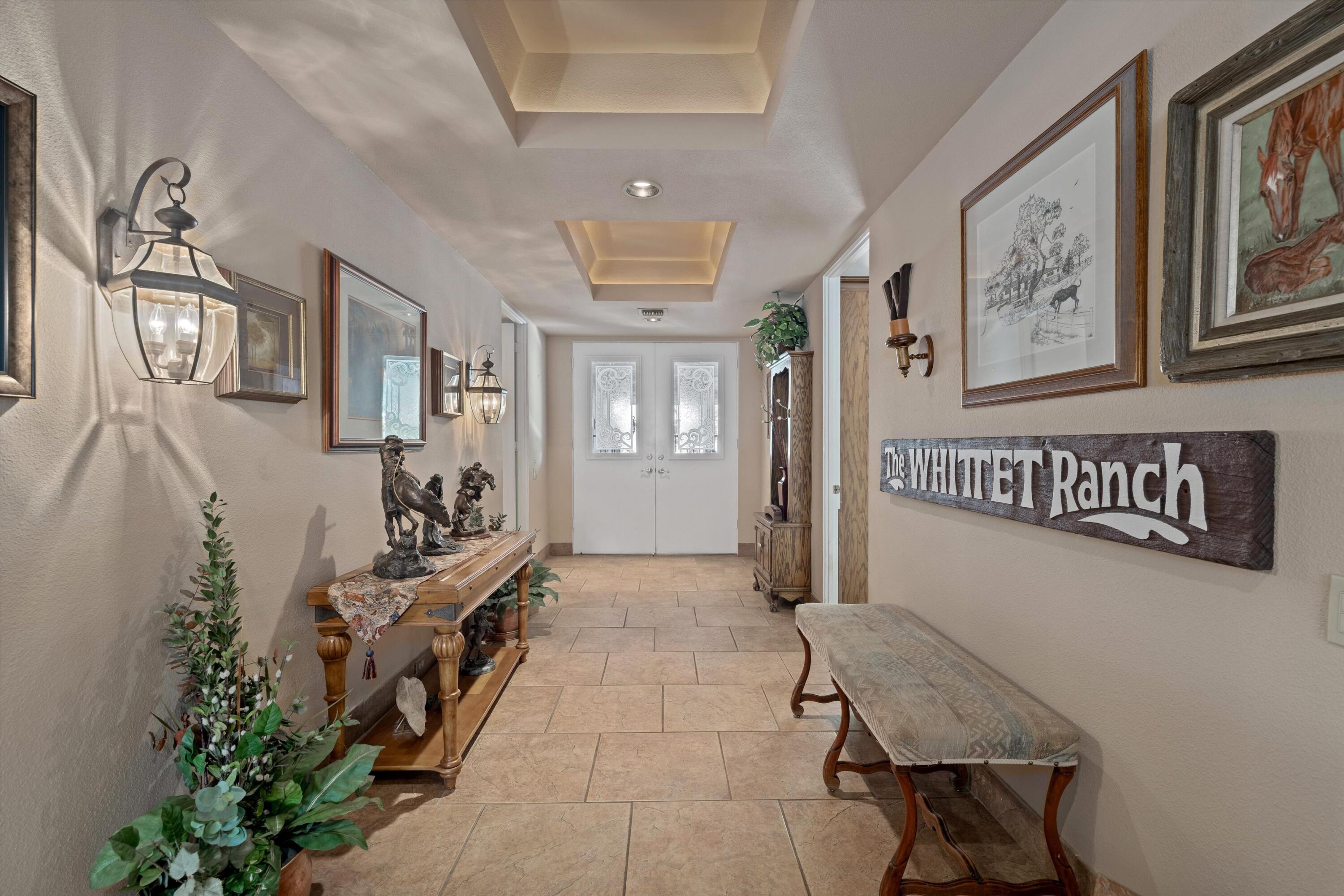 48 Cornell Drive Rancho Mirage, CA 92270 - Photo 6 of 39 a view of a hallway with seating area