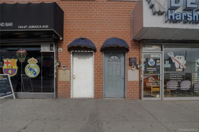 a view of a wooden door with a couple of people