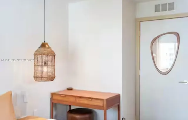 a front view of a house with washer and dryer