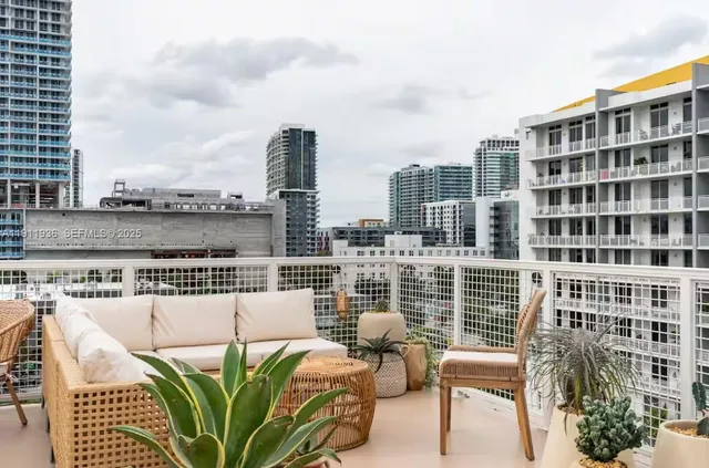a view of a balcony with a couch