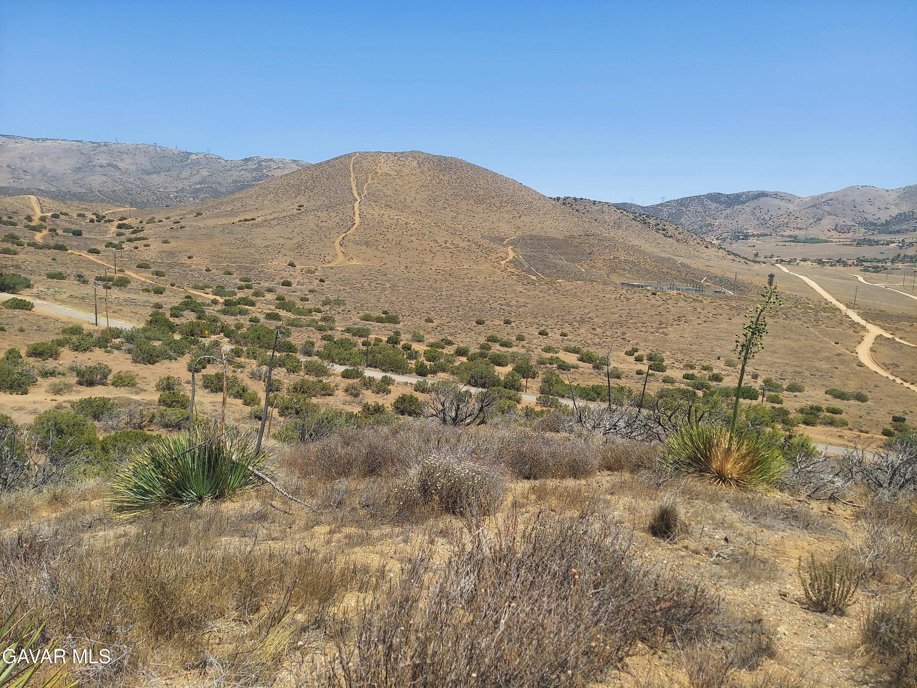 1 Governor Mine Road Acton, CA 93510 - Photo 11 of 41 a view of a mountain range in a cloudy sky