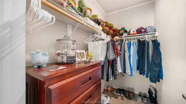 a view of workspace with furniture and window