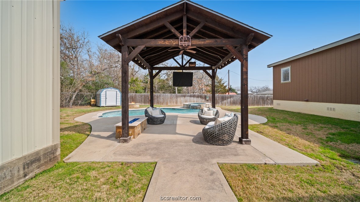 115 Cedar Lane Somerville, TX 77879 - Photo 26 of 50 a view of a patio with table and chairs a barbeque with potted plants