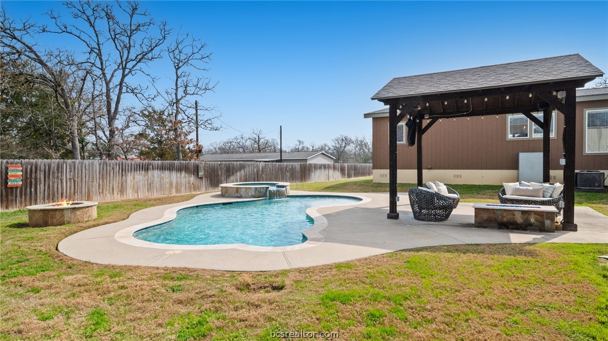 115 Cedar Lane Somerville, TX 77879 - Photo 31 of 50 a view of a swimming pool with a patio