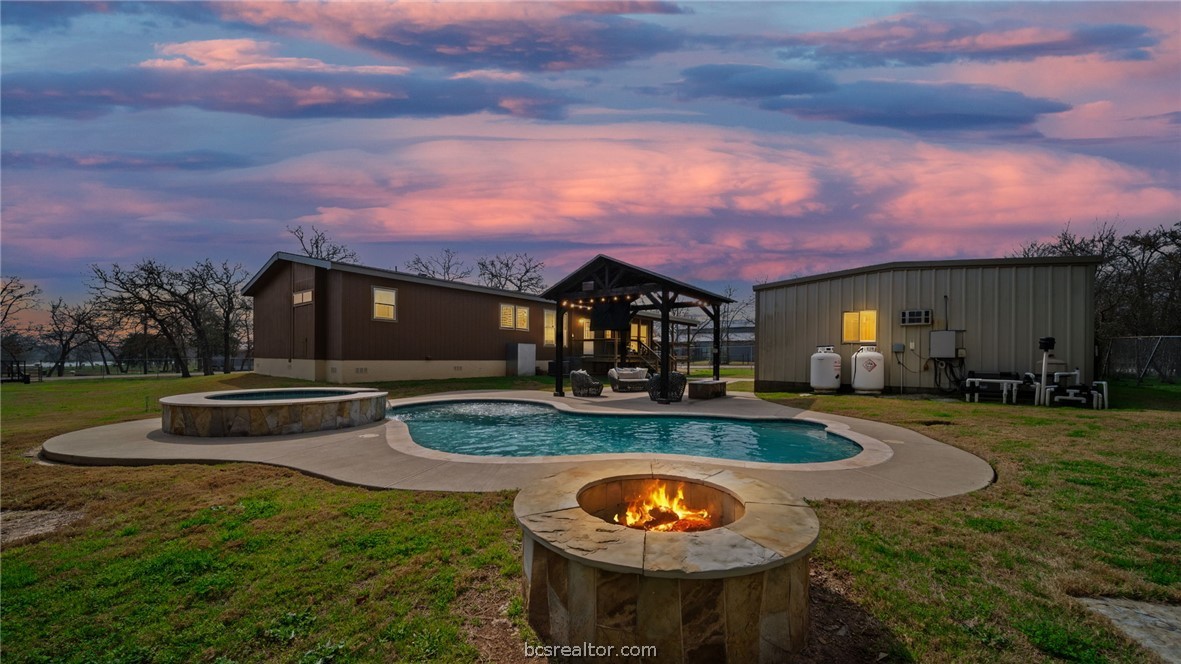 115 Cedar Lane Somerville, TX 77879 - Photo 50 of 50 a view of a house with swimming pool and a yard