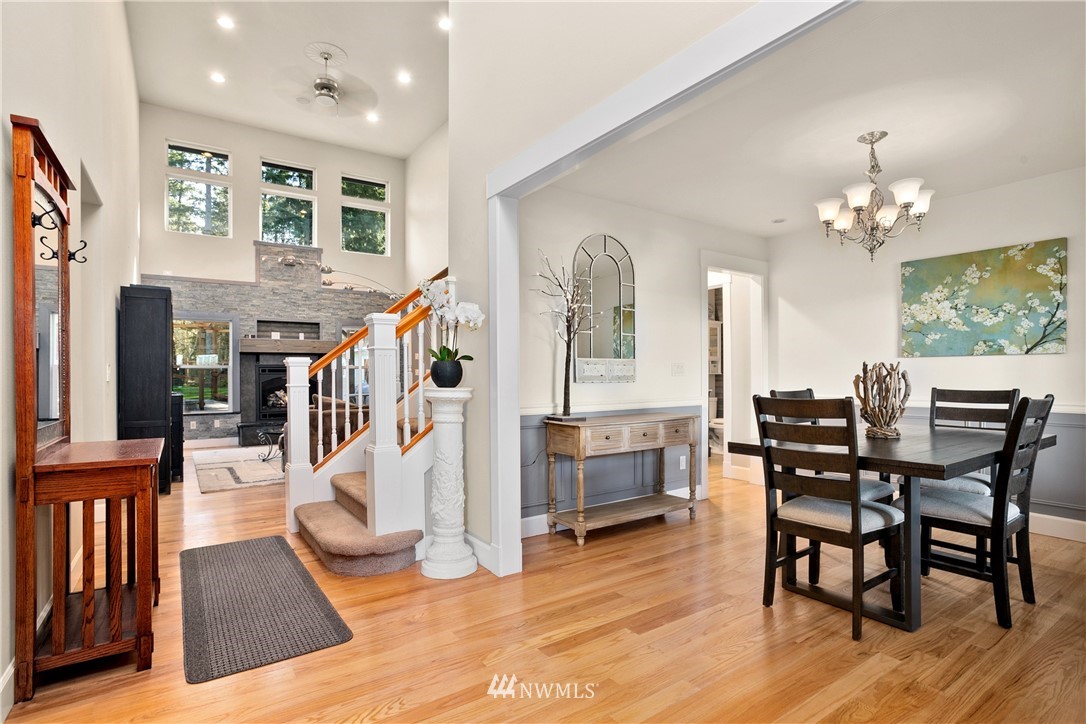 27515 Rose Road Arlington, WA 98223 - Photo 2 of 34 a view of a livingroom with furniture bedroom and wooden floor