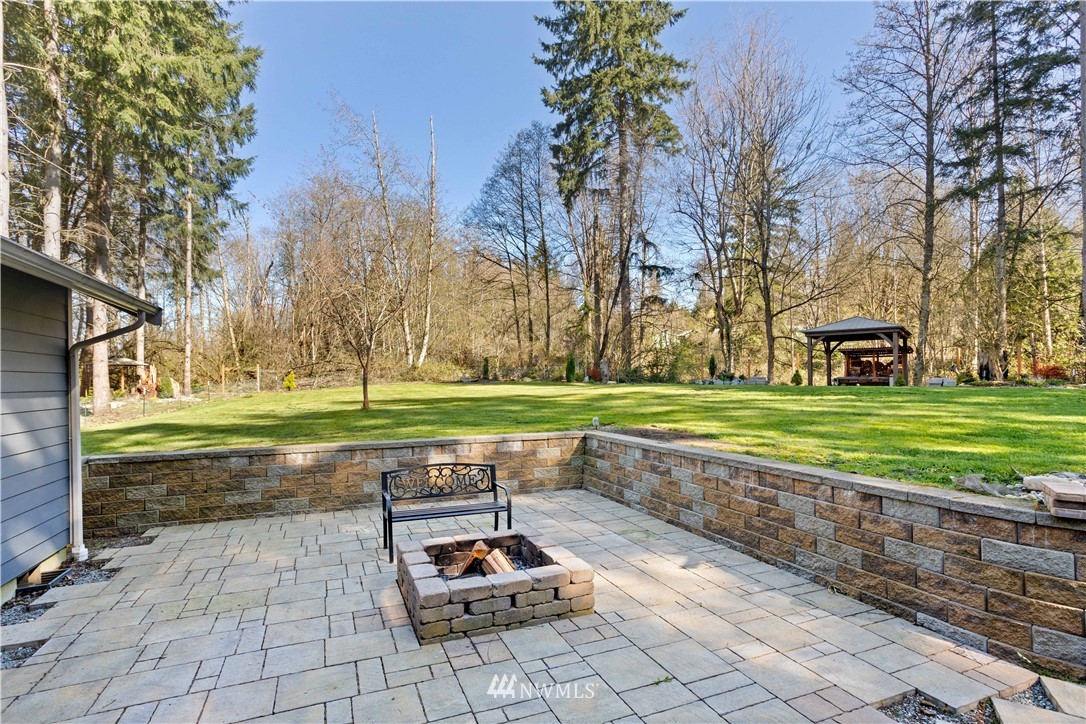 27515 Rose Road Arlington, WA 98223 - Photo 27 of 34 a view of a park with large trees