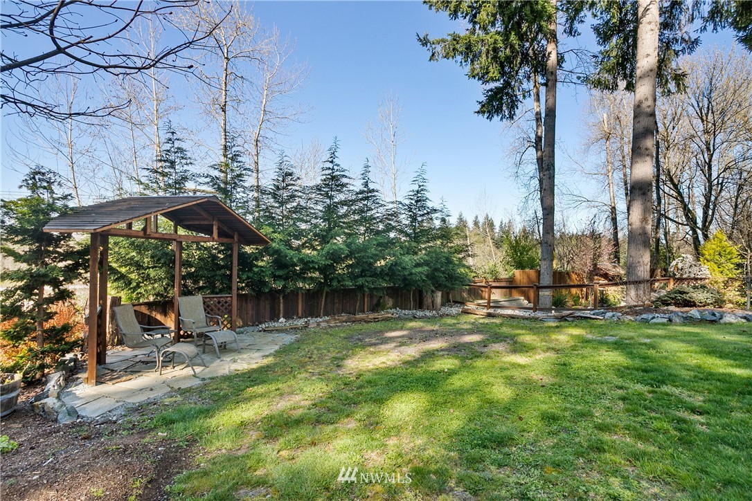 27515 Rose Road Arlington, WA 98223 - Photo 31 of 34 a view of a park with large trees