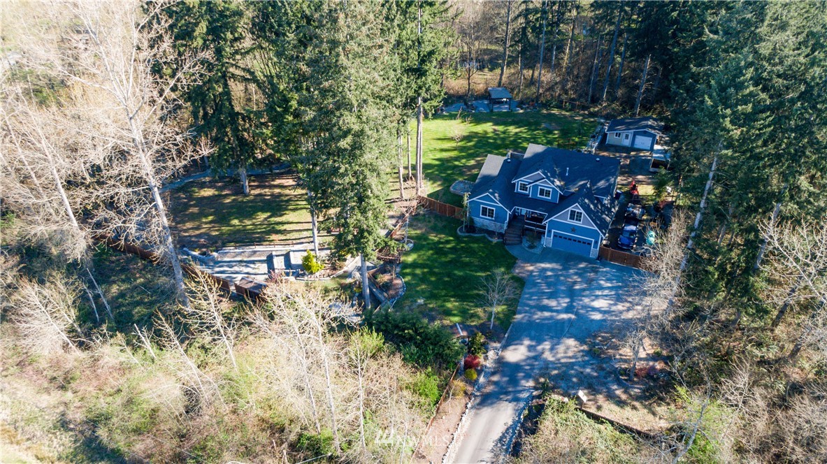 27515 Rose Road Arlington, WA 98223 - Photo 33 of 34 an aerial view of a house with a yard basket ball court and outdoor seating