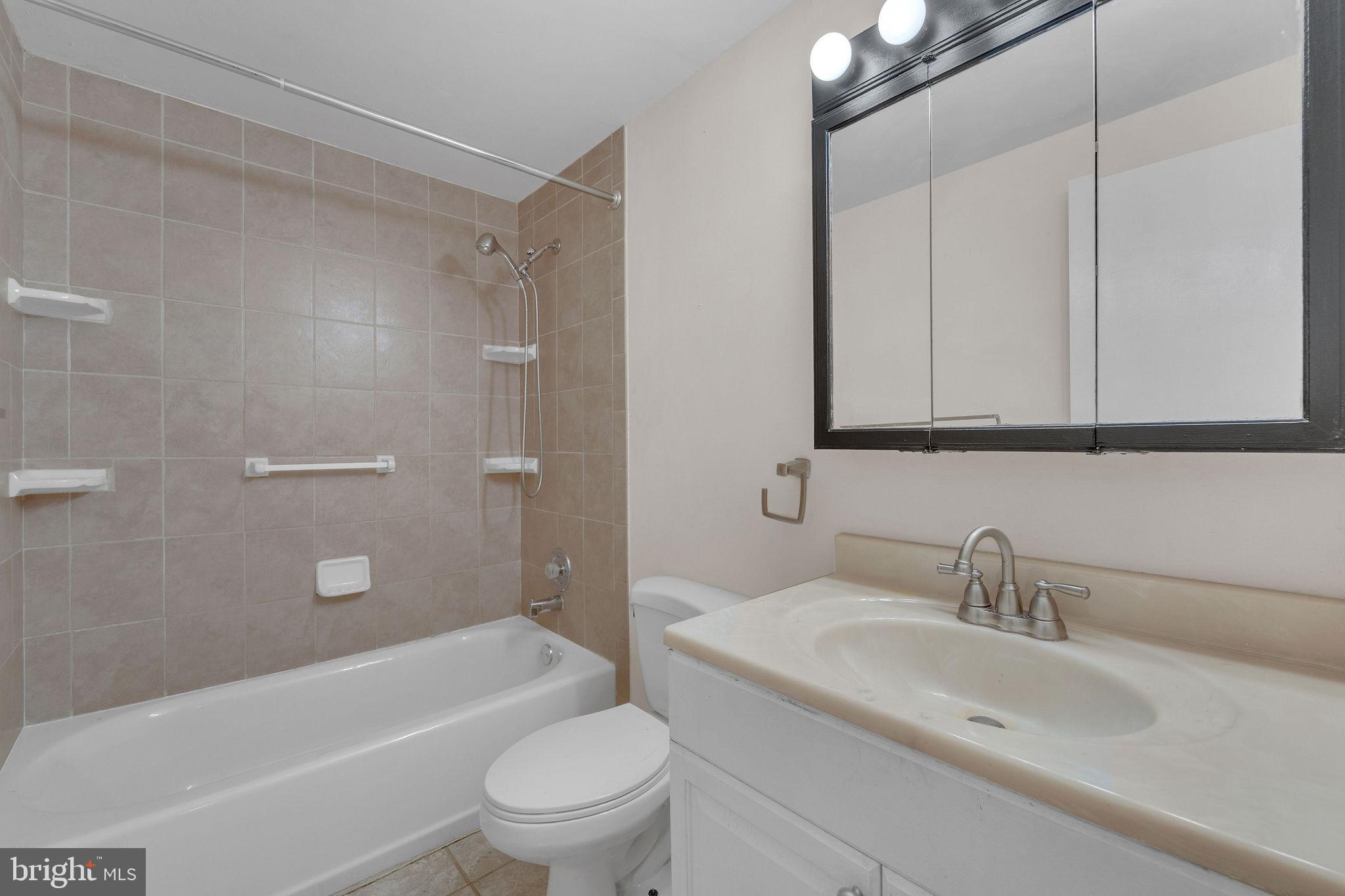 40 Rittenhouse Drive Willingboro, NJ 08046 - Photo 23 of 30 a bathroom with a sink toilet and shower