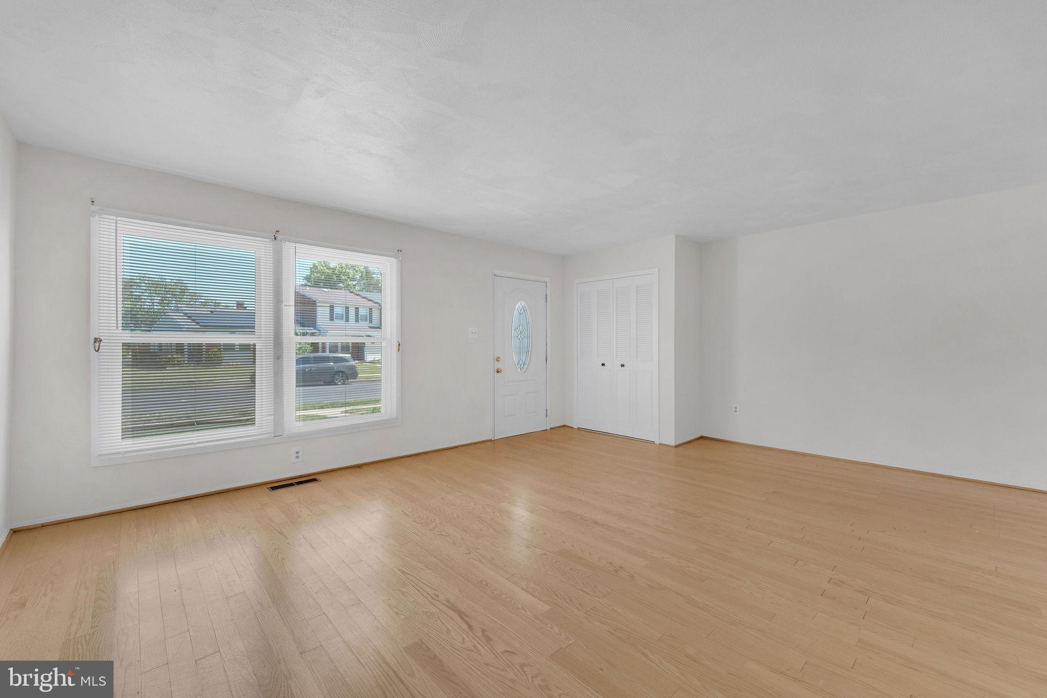 40 Rittenhouse Drive Willingboro, NJ 08046 - Photo 6 of 30 a view of an empty room with a window and wooden floor