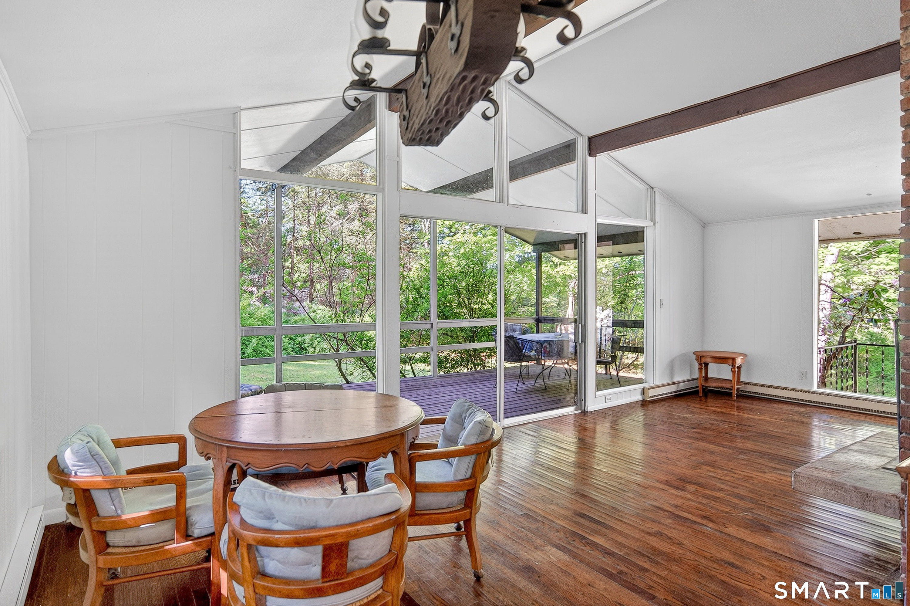 4 Pepper Pond Road Sherman, CT 06784 - Photo 10 of 33 a view of a dining room with furniture window and wooden floor