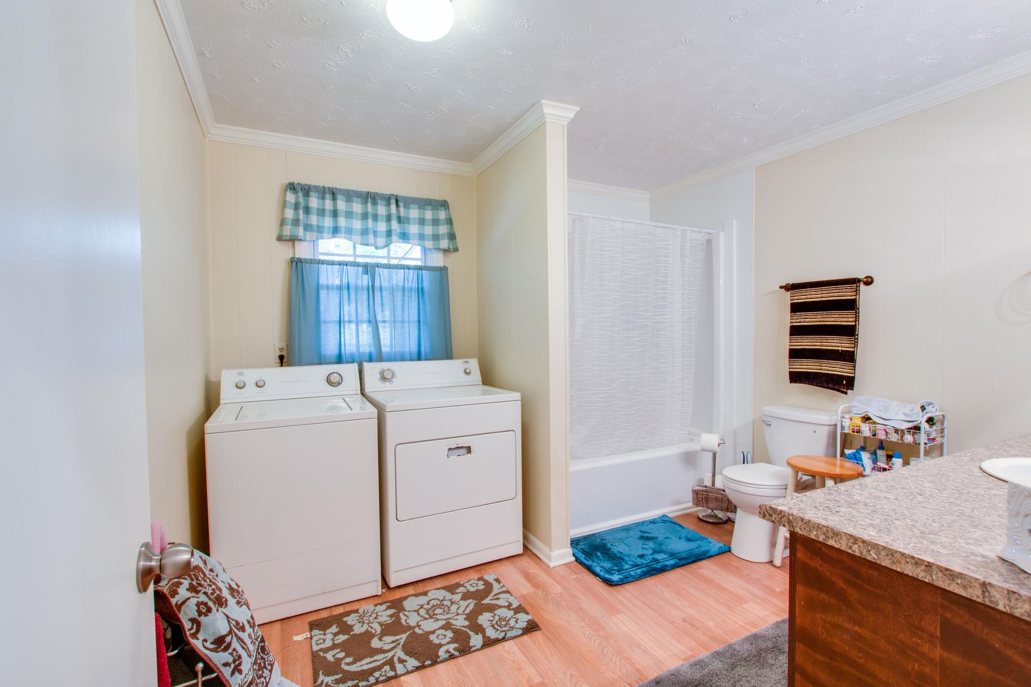 111 West Toliver Road Manchester, TN 37355 - Photo 15 of 19 also has the laundry area and extra storage