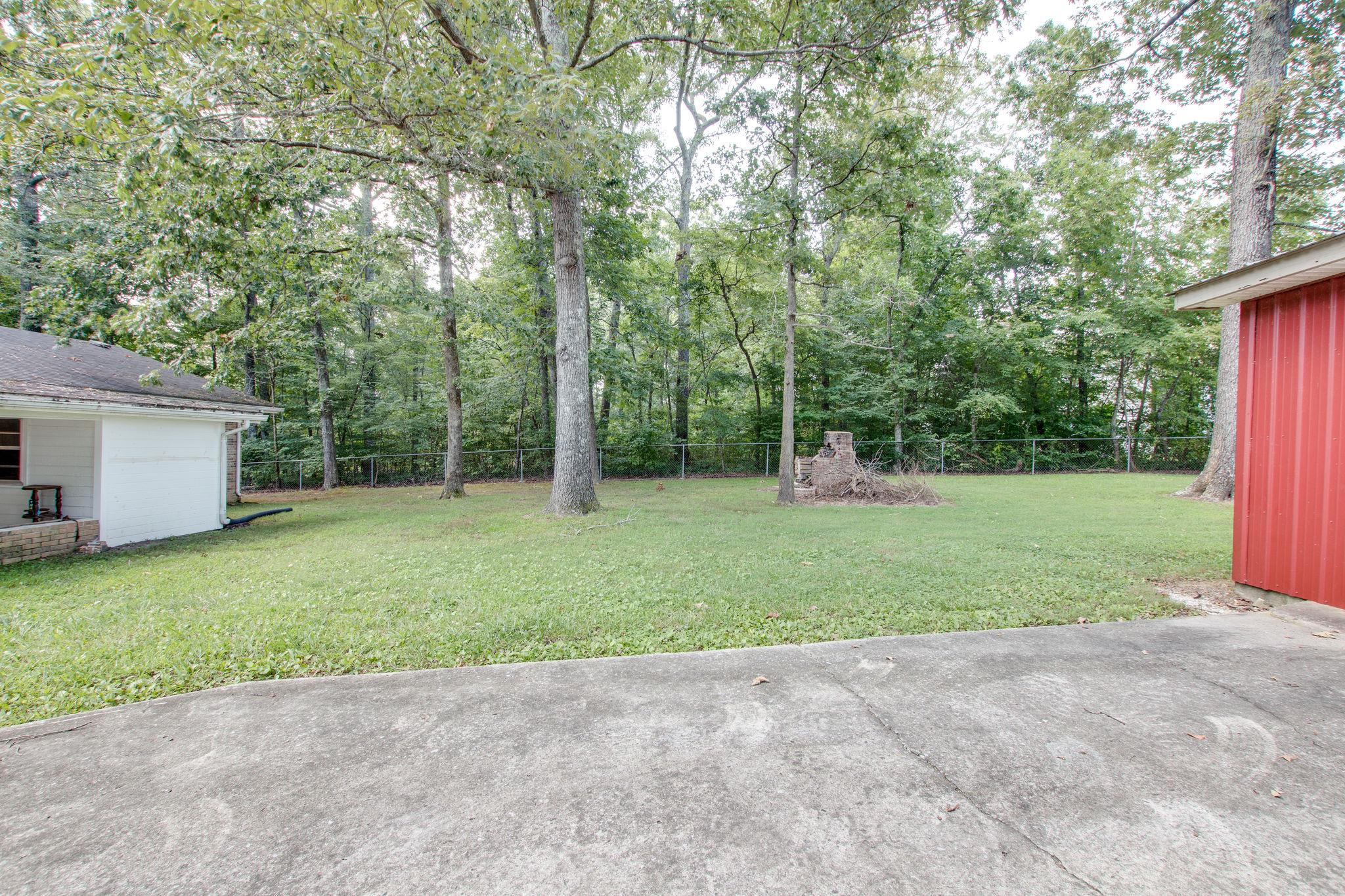 111 West Toliver Road Manchester, TN 37355 - Photo 4 of 19 Back yard with fire pit