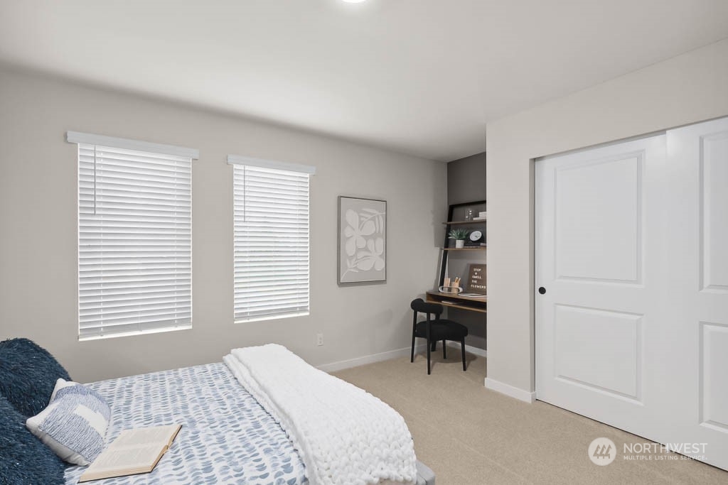 19524 16th Avenue Southeast, Unit B5 Bothell, WA 98012 - Photo 12 of 20 a bedroom with a bed and a window