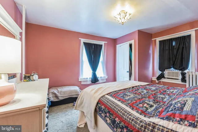 a room with a couch and a window