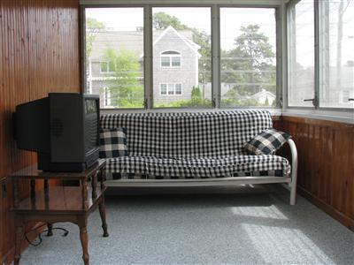 29 Bain Road Dennis Port, MA 02639 - Photo 19 of 21 a view of a chair and table in the balcony