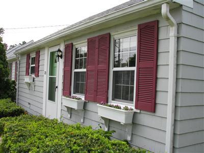 29 Bain Road Dennis Port, MA 02639 - Photo 3 of 21 a front view of a house with a porch