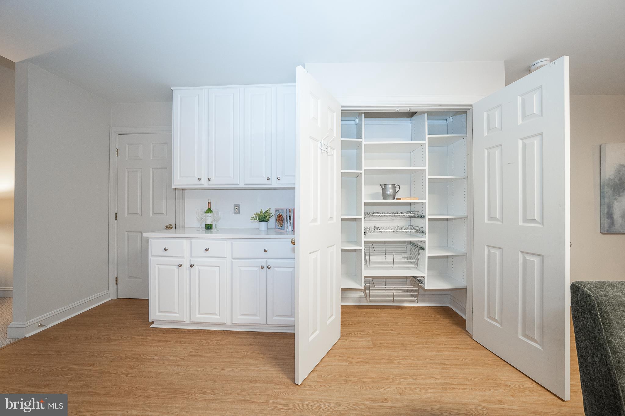 824 Waverly Road Kennett Square, PA 19348 - Photo 13 of 42 a view of cabinets and wooden floor